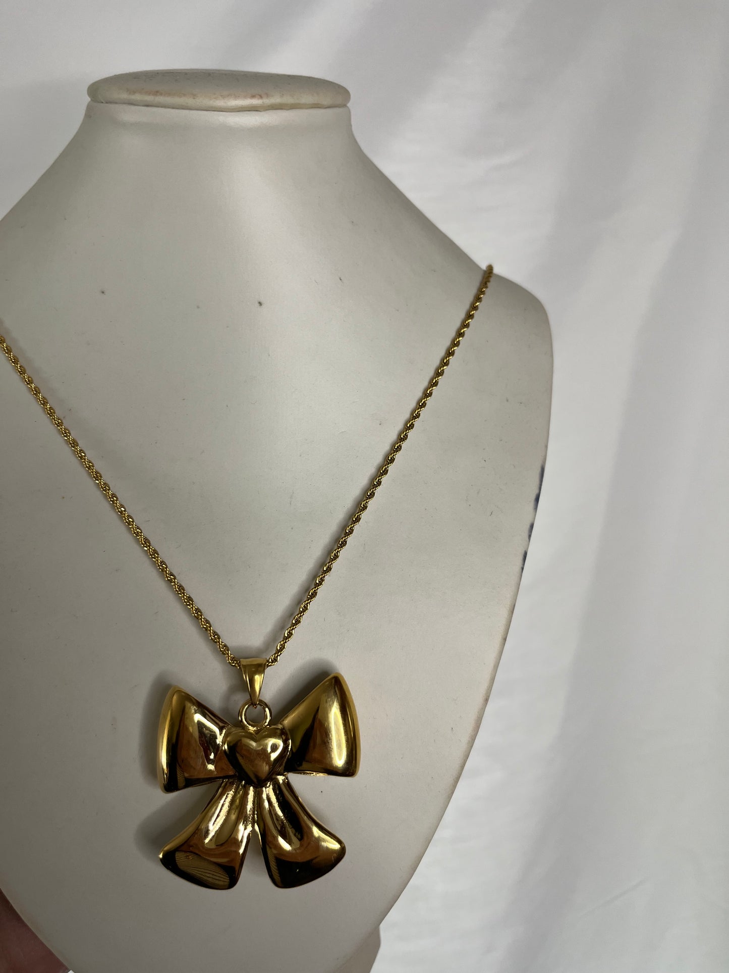 Collana e orecchini fiocco