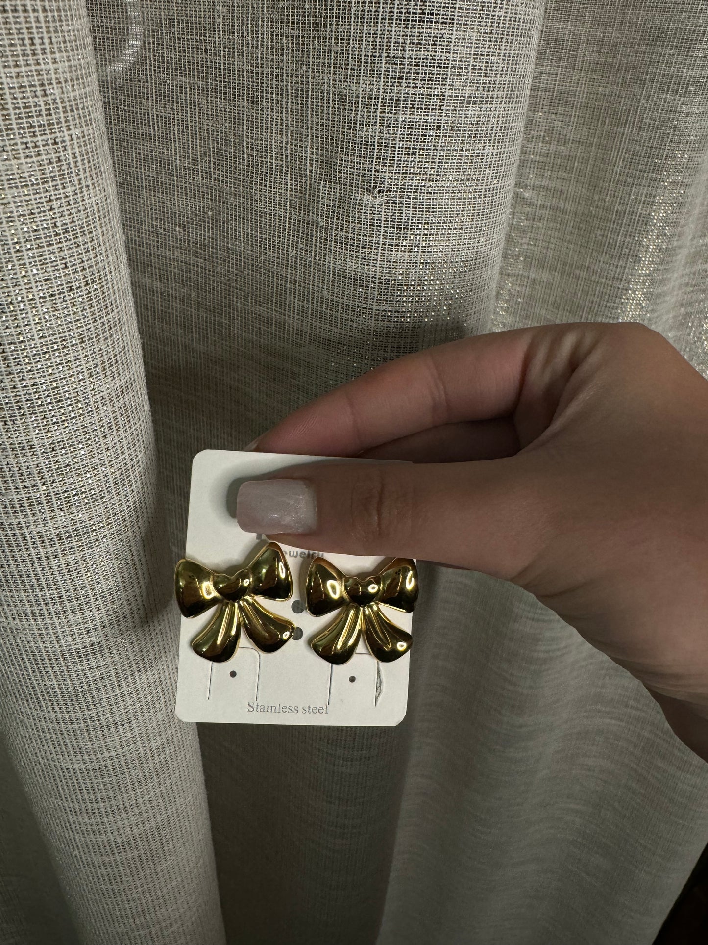 Collana e orecchini fiocco