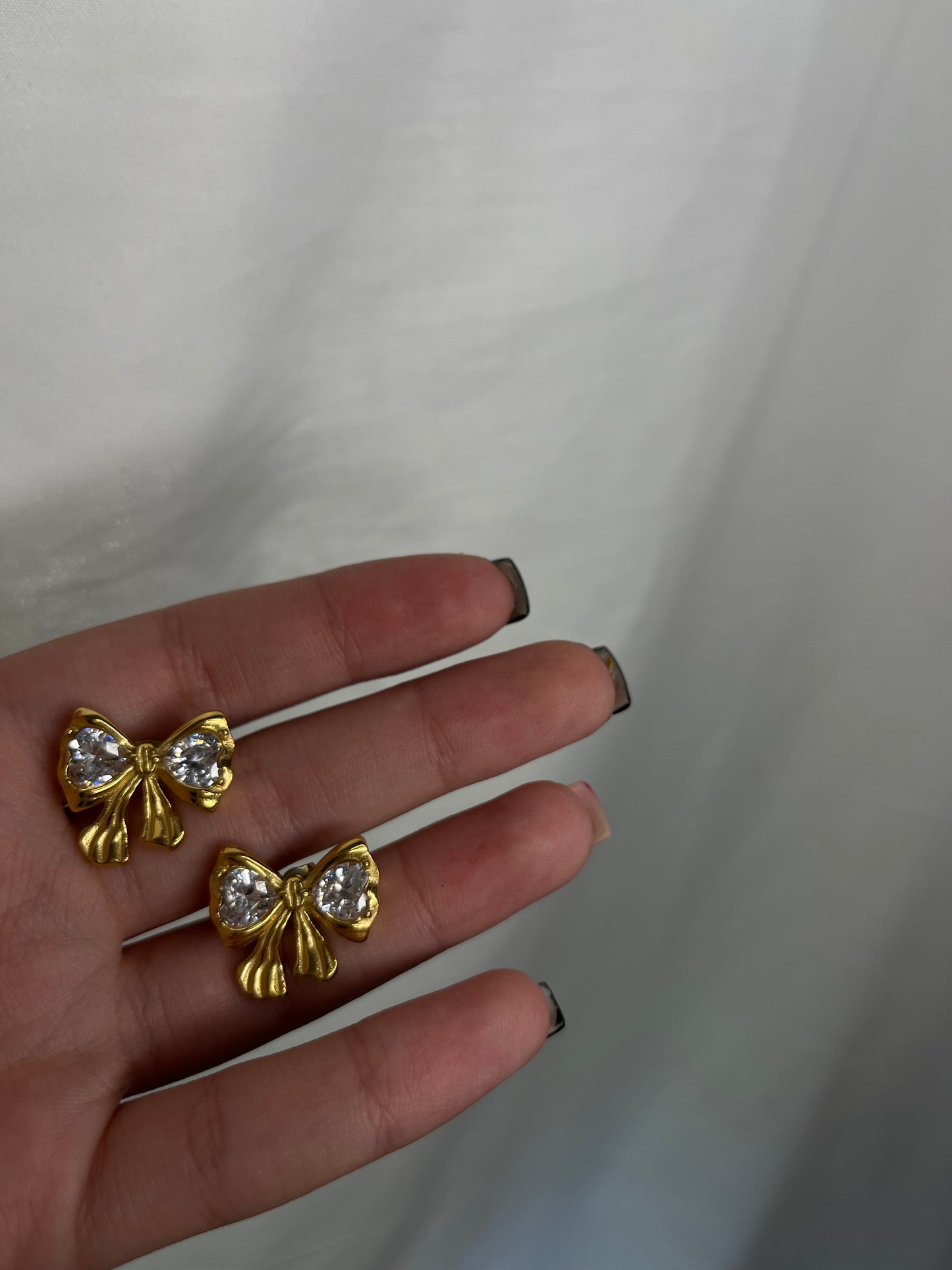 Collana e orecchini fiocco