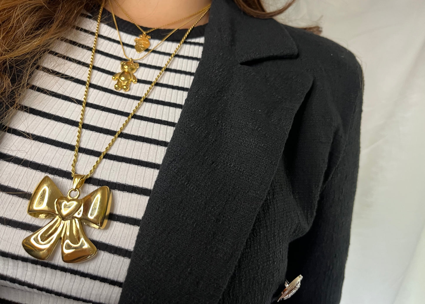 Collana e orecchini fiocco